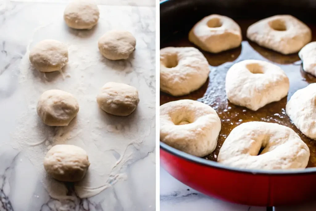 Hands kneading smooth egg bagel dough on a floured surface with ingredients like flour, baking powder, salt, and egg wash nearby.