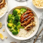 Grilled Teriyaki Chicken glazed with teriyaki sauce and vegetables